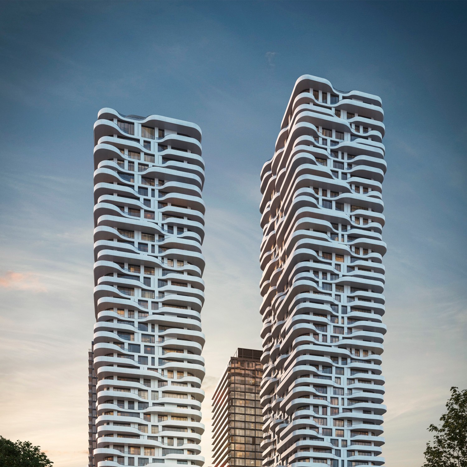 Dans le quartier en plein essor de Greater Golden Horseshoe à Toronto, des bandes de balcons marquées apportent des accents sculpturaux au lieu de la rigueur formelle de nombreuses tours d'habitation. (Architecture : CORE Architects)