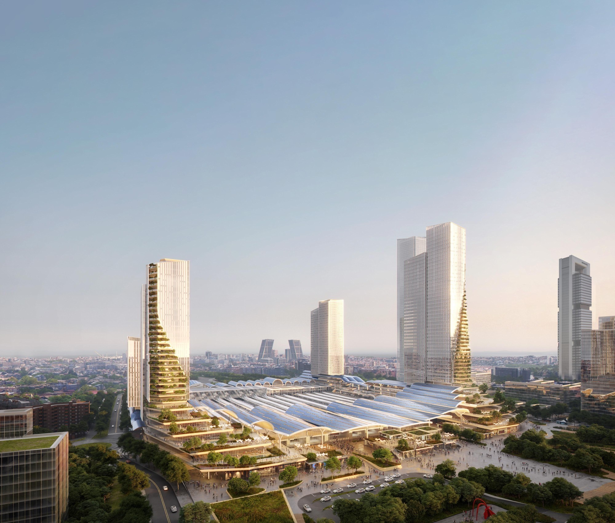 Visualisation de la gare entourée de plusieurs immeubles de grande hauteur.