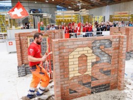 Ben Zaugg pendant les dernières minutes de la compétition: l'engagement de l'Emmentalois a été récompensé par le titre de champion du monde. Le maçon qui a suivi son apprentissage chez Hans Schmid AG, à Rüderswil, où il travaille toujours, a gravi la plus